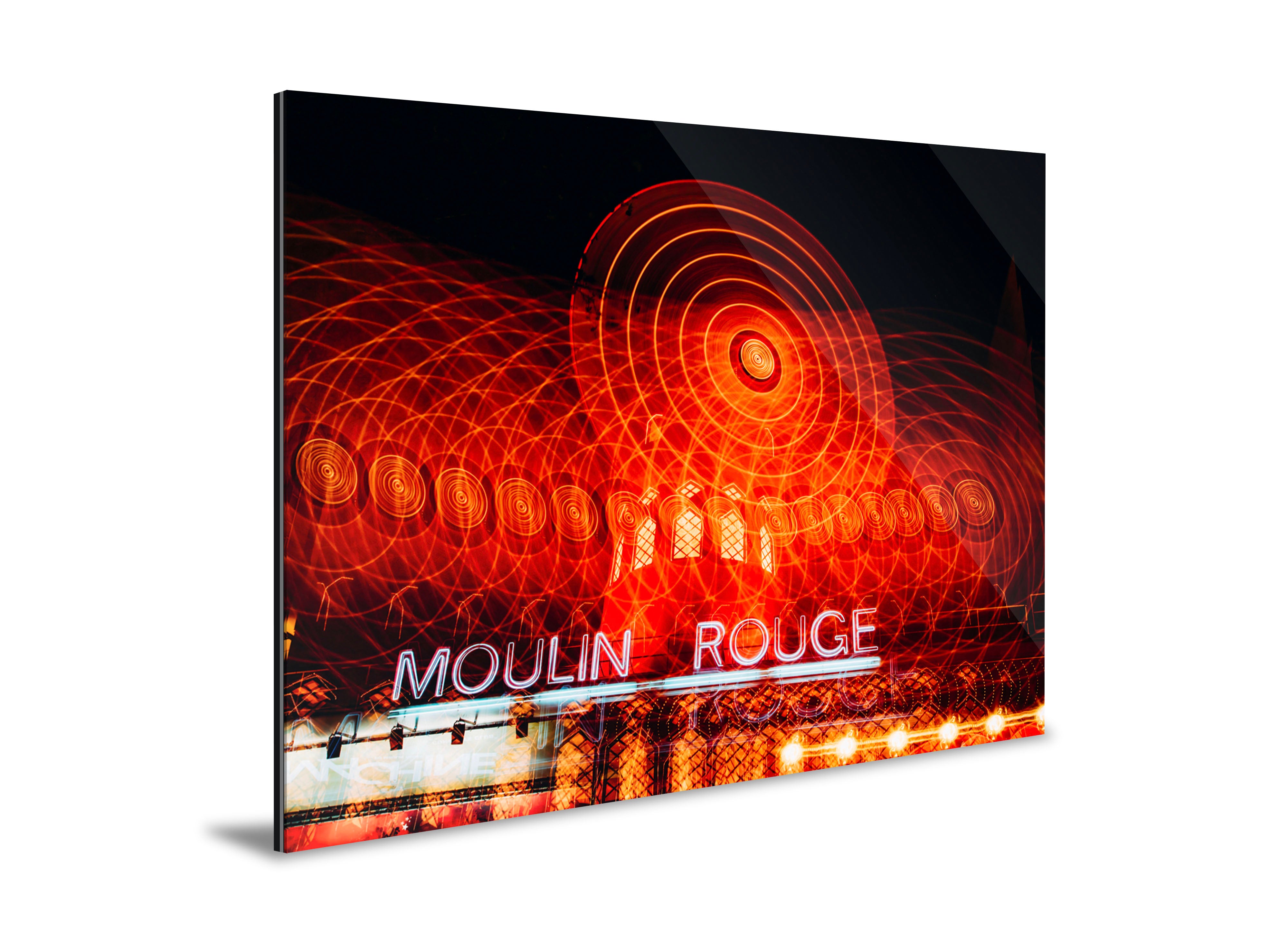 Photo of Moulin Rouge in Paris with bright beautiful and bold red and passionate colors photographed by Jeremiah Alley